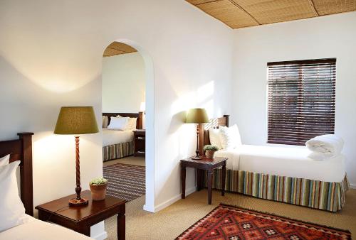 Una cama o camas en una habitación de Elephant House