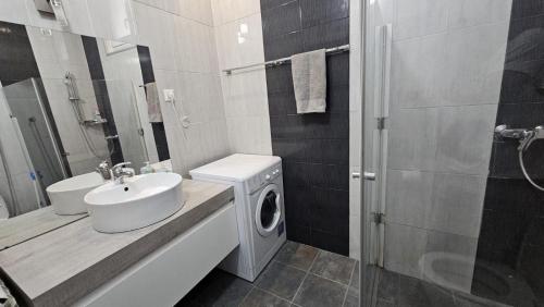 Et badeværelse på City center apartment