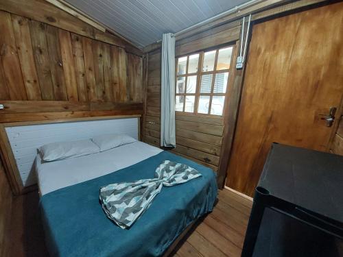 Rúm í herbergi á Hostel Pantanal Em Florianópolis