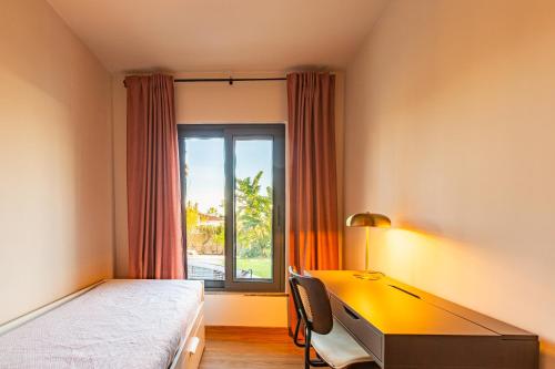 Ένα ή περισσότερα κρεβάτια σε δωμάτιο στο Casa Rubi