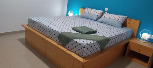 เตียงในห้องที่ Edly aparatments