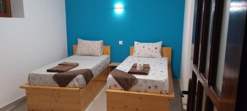 เตียงในห้องที่ Edly aparatments