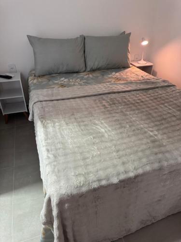 Postel nebo postele na pokoji v ubytování Pousada Oito Mares