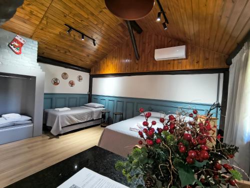 Кровать или кровати в номере Casa da Lagoa - Gasthaus Pomerode