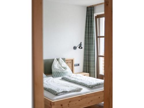 Postel nebo postele na pokoji v ubytování Rennerhof in the Lesach Valley