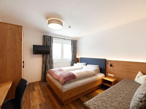 Postel nebo postele na pokoji v ubytování Holiday apartment with 10 bedrooms