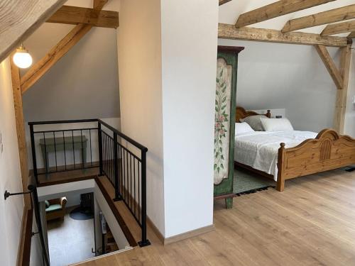 Ένα ή περισσότερα κρεβάτια σε δωμάτιο στο Little Green Basedow