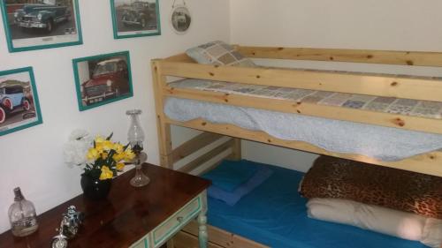 Ένα ή περισσότερα κρεβάτια σε δωμάτιο στο Casa d'Alegria Madeira Island