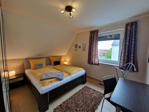 En eller flere senge i et værelse på WellNest Family Residence