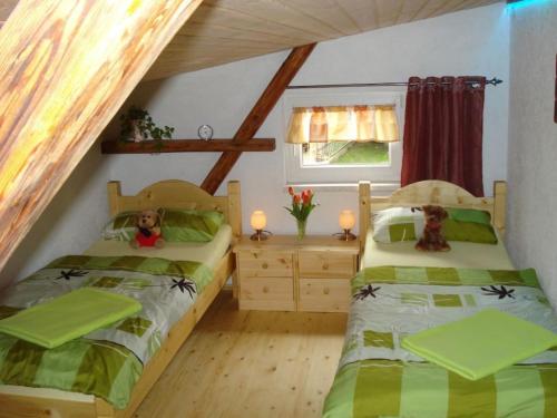 En eller flere senge i et værelse på Holiday apartment with 3 bedrooms