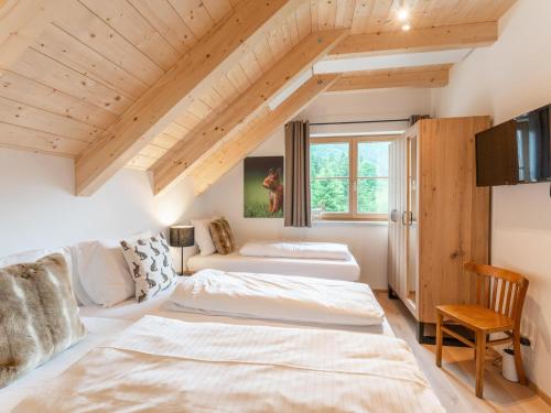 Una cama o camas en una habitación de Chalet Norah