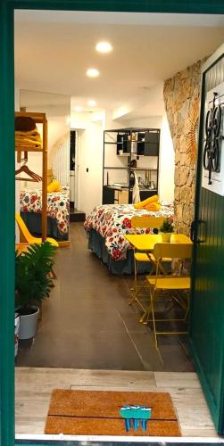 Кровать или кровати в номере Art Apartments Leiria Historic House