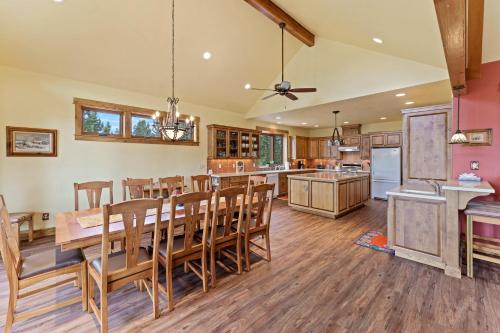 a large kitchen and dining room with a table and chairs at High Lowe in Bend