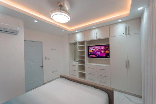 Postel nebo postele na pokoji v ubytování Jare Residence