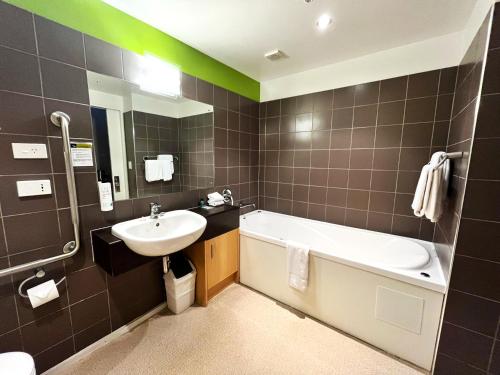 Koupelna v ubytování Park View Motor Lodge