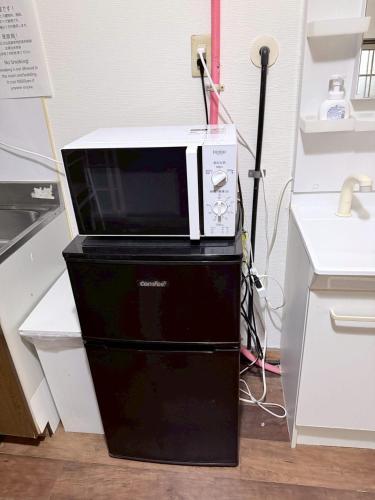 Two rooms with three beds apt close to Dotonbori