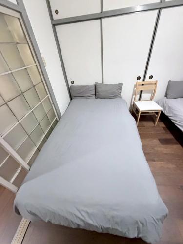 Two rooms with three beds apt close to Dotonbori