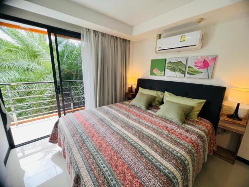 En eller flere senge i et værelse på Apartments MBC 1308