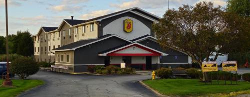 a large building with a fast food restaurant at Super 8 by Wyndham Youngstown/Austintown in Youngstown