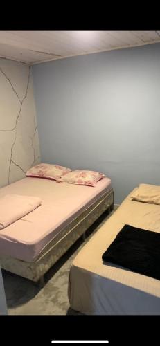 En eller flere senge i et værelse på Family House