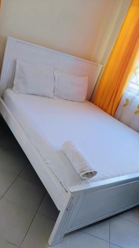 Llit o llits en una habitació de Phee home