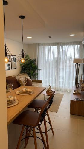 Фотография из галереи Bello apartamento en edificio Vivo Costanera Frente a la playa! Con Parking в городе Энкарнасьон