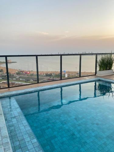 Bello apartamento en edificio Vivo Costanera Frente a la playa! Con Parking