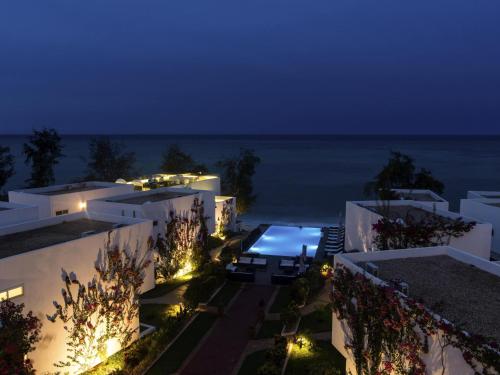 an aerial view of a building at night at Nungwi Dreams by Mantis in Nungwi