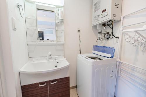 Koupelna v ubytování Great ocean views! AMS 海宝楼