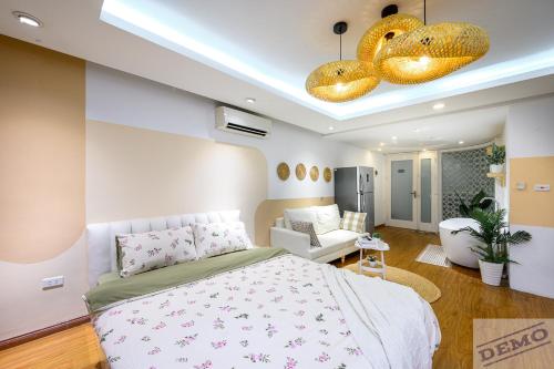 Ένα ή περισσότερα κρεβάτια σε δωμάτιο στο Paradise Ton Duc Thang by Luxe Hospitality