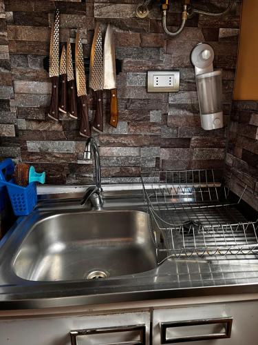 Η κουζίνα ή μικρή κουζίνα στο Apartamentos Natales May 21