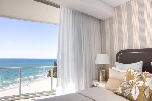 En eller flere senge i et værelse på Reflections 1705