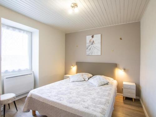 Ένα ή περισσότερα κρεβάτια σε δωμάτιο στο Maison périgourdine avec piscine chauffée et WiFi - FR-1-616-518