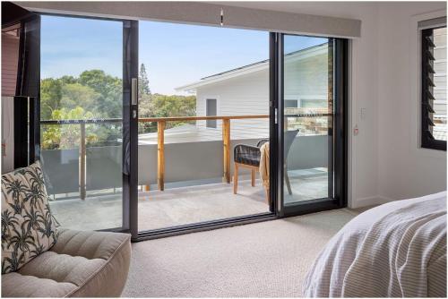 En eller flere senge i et værelse på Walu House