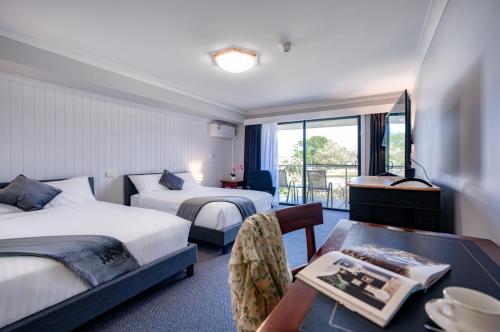 Postel nebo postele na pokoji v ubytování Panorama Hotel St Helens