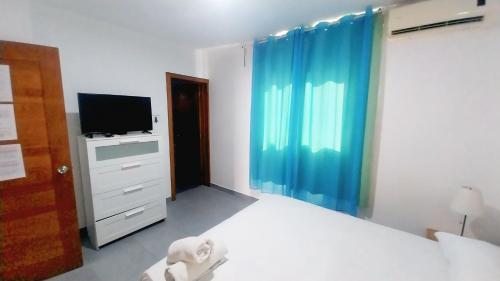 Кровать или кровати в номере Punta Cana Beach - ONE BEDROOM RENTALS 1