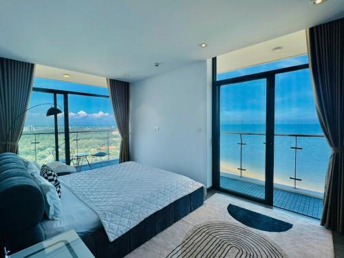 Postel nebo postele na pokoji v ubytování Condotel CSJ Tower Vũng Tàu - Căn hộ du lịch cạnh biển