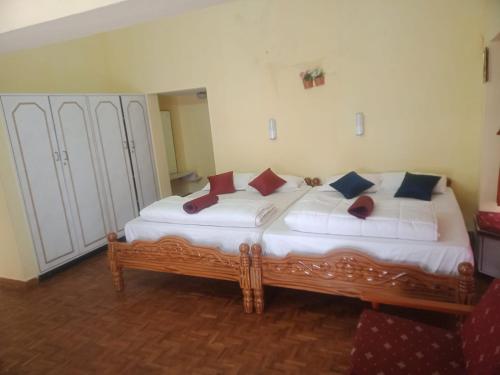 Ένα ή περισσότερα κρεβάτια σε δωμάτιο στο Sunshine Royale