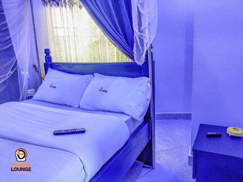 Postel nebo postele na pokoji v ubytování Travel Connect