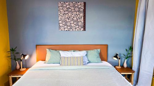 Ein Bett oder Betten in einem Zimmer der Unterkunft CenterPoint Thong Sala