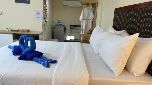 Ένα ή περισσότερα κρεβάτια σε δωμάτιο στο Kim house Koh Jum