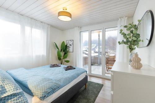 Ένα ή περισσότερα κρεβάτια σε δωμάτιο στο Mountain view with balcony and free parking