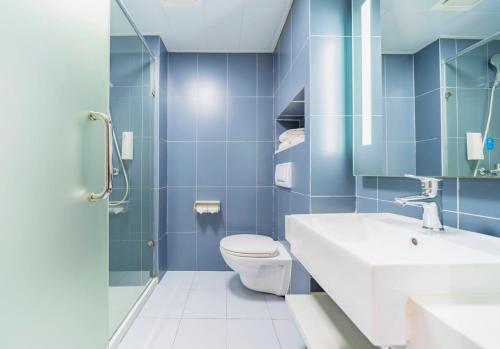 Et badeværelse på Hanting Hotel Shanghai Wujing East China Normal University