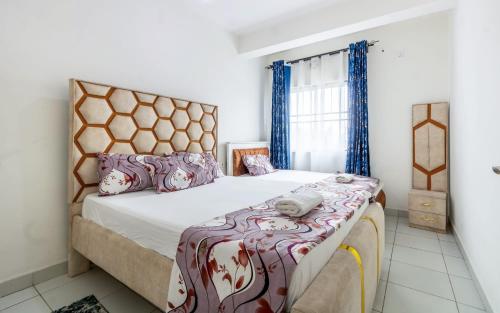 Кровать или кровати в номере Bstan at Buxton with AC