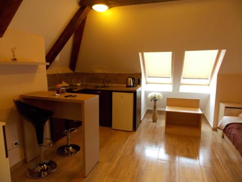 A kitchen or kitchenette at Apart Hotel Rosen