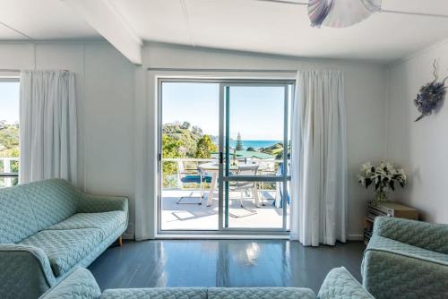 Et opholdsområde på Roses Bach - Stay Waiheke