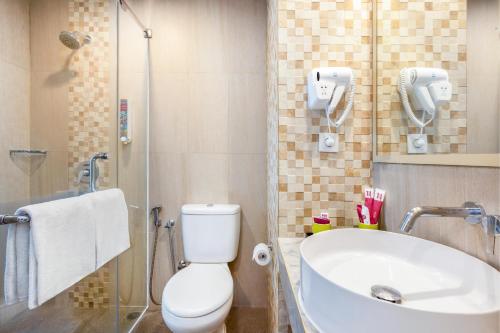 Koupelna v ubytování favehotel Malioboro - Yogyakarta