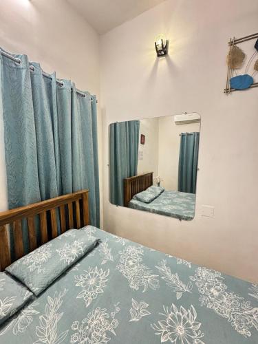 En eller flere senge i et værelse på Casa Fiesta Pondy