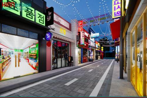 eine digitale Darstellung einer Stadtstraße mit Geschäften in der Unterkunft Như Ba Farmstay in Kon Rung (1)