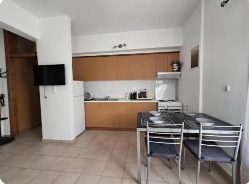 Kuchyň nebo kuchyňský kout v ubytování The Balcony of Meteora 2